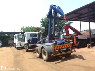 NEW or USED hook-lift trucks and bins, are you looking  for one now?