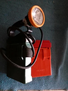 Gold Miner head lamp and battery pack plus spare battery.  80s era.