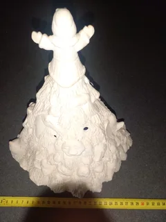 Chrìstmas tree ceramic with wild animals ready to paint and has holes for placing candle inside