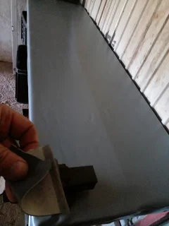 Grey rubber auto material or cover table top or where you might needs some.