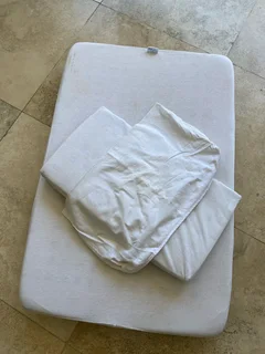 Baby cot mattress with pillow
