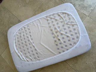 Baby cot mattress with pillow
