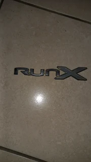 Toyota runx bootlid badge