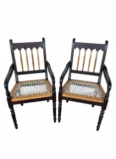 2 x yellow wood and stink wood arm chairs