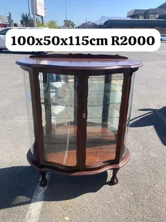 Ball&claw imbuai oval display cabinet with glass shelves