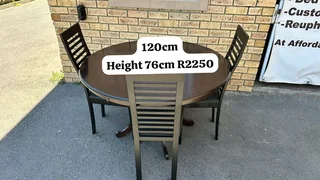 Round dining table with 3 chairs