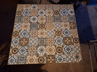 Garden Table in iron and top in tiles