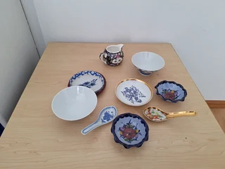 Tea pot, plates, bowls and spoons