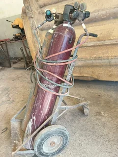 GAS BOTTLES ON TROLLEY COMPLETE