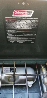 Coleman dual fuel camping stove, suitcase type