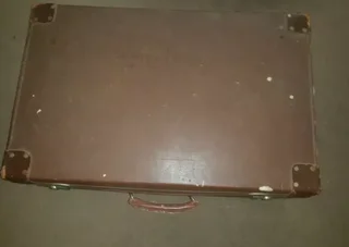 Vintage collectable and fully ready for use leather clad suitcase in excellent condition