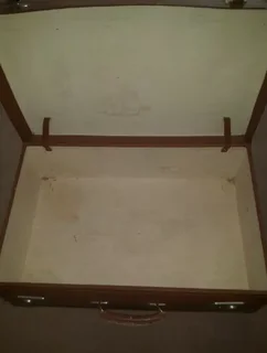 Vintage collectable and fully ready for use leather clad suitcase in excellent condition