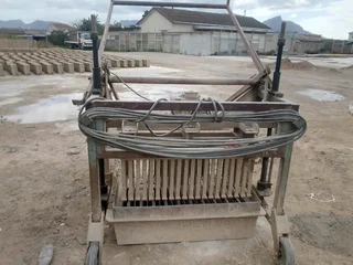 Block making machines Wilkinson and doubel and pan mixers