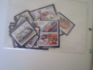 USA Postal Service Album showing  Stamps issued between 1984 to 1987