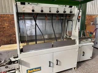 AUTOMATIC THROUGH FEED SPRAYER