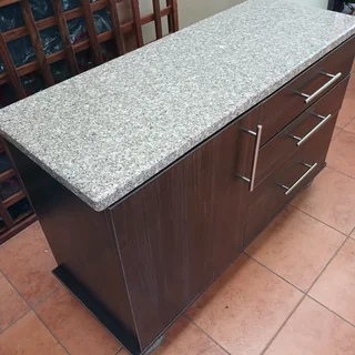 Kitchen sideboard on wheels with granite top