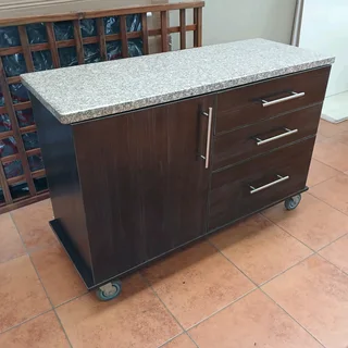 Kitchen sideboard on wheels with granite top