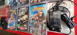 SONY PSP 1000 GOLD WITH GAMES AND ACCESSORIES0️⃣7️⃣2️⃣3️⃣9️⃣2️⃣5️⃣7️⃣5️⃣6️⃣