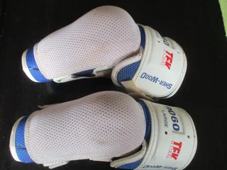 Ice hockey gloves and elbow guards
