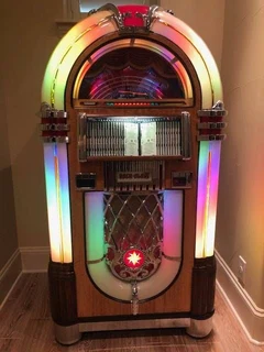 New Rock Ola Jukebox in 7&#34; vinyl, 100CD, Digital. Unique retro antique look