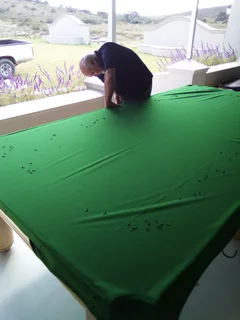 Recovering of Snooker and Pool tables with a new cloth
