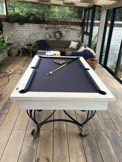 Recovering of Snooker and Pool tables with a new cloth