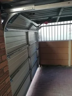 Sectional garage doors repair specialist and replacement parts