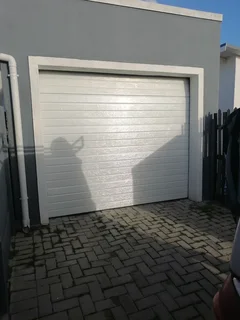 Sectional garage doors repair specialist and replacement parts