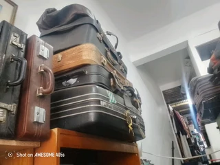 Large selection of vintage suitcases