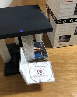 CD Gallery rotating Compact Discs display and storage unit holds 120 cd’s