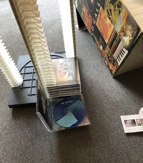 CD Gallery rotating Compact Discs display and storage unit holds 120 cd’s