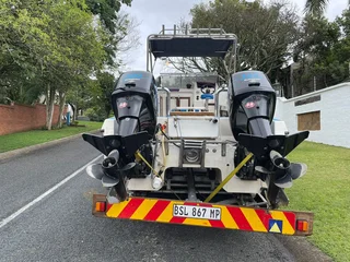 SWIFT 575 ON TRAILER 2 X 150 HP MERCURY OPTIMAX 83 HOURS