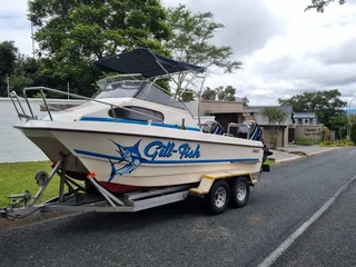 SWIFT 575 ON TRAILER 2 X 150 HP MERCURY OPTIMAX 83 HOURS