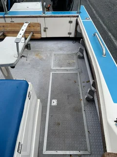 SWIFT 575 ON TRAILER 2 X 150 HP MERCURY OPTIMAX 83 HOURS