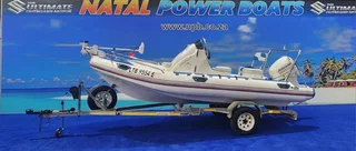 UNIQUE 540 ON TRAILER 115 HP JOHNSON