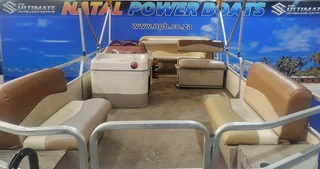 SUN TRACKER 18 SIGNATURE SERIES ON TRAILER 60 HP MERCURY 4 STROKE