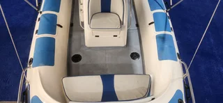 UNIQUE 575 RTB ON TRAILER 2 X 60 HP MERCURY TRIM AND TILTS FINANCE ARRANGED