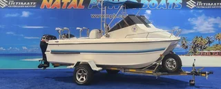 Cobra Cat 525 On Trailer 2 X 70 Hp Suzuki 4 Strokes