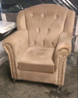 New beige velvet armchair with buttons