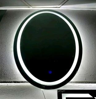 Oval frameless mirror with LED light