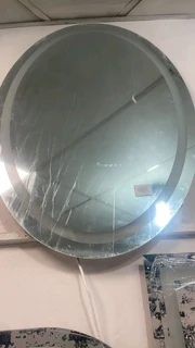 Oval frameless mirror with LED light