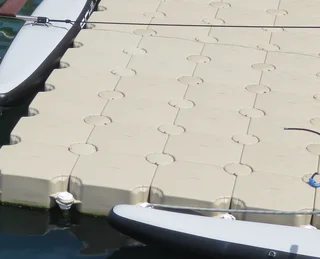 Floating dock system - boat/ jet-ski slide
