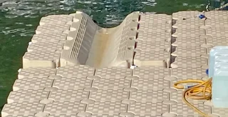 Floating dock system - boat/ jet-ski slide