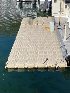 Floating dock system - boat/ jet-ski slide