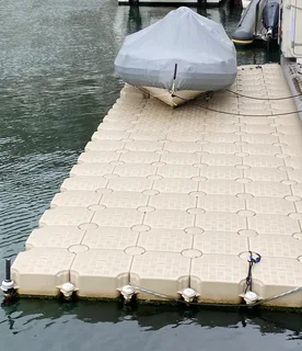 Floating dock system - boat/ jet-ski slide