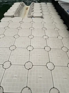 Floating dock system - boat/ jet-ski slide