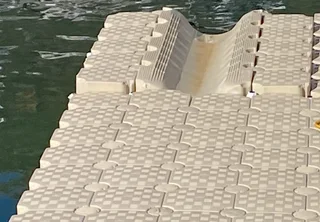 Floating dock system - boat/ jet-ski slide