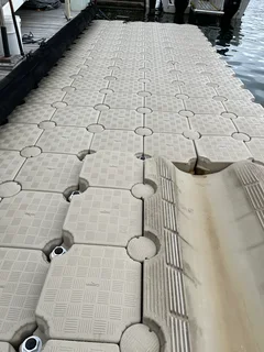 Floating dock system - boat/ jet-ski slide