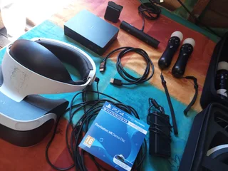 Playstation 4 VR setup complete x2. Awesome family fun, great deal!!!