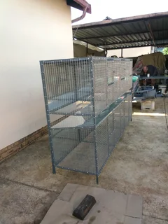 AVIARIES  AND BREEDING  CAGES for RABBITS  and other PETS according  bird  breeders  specifications